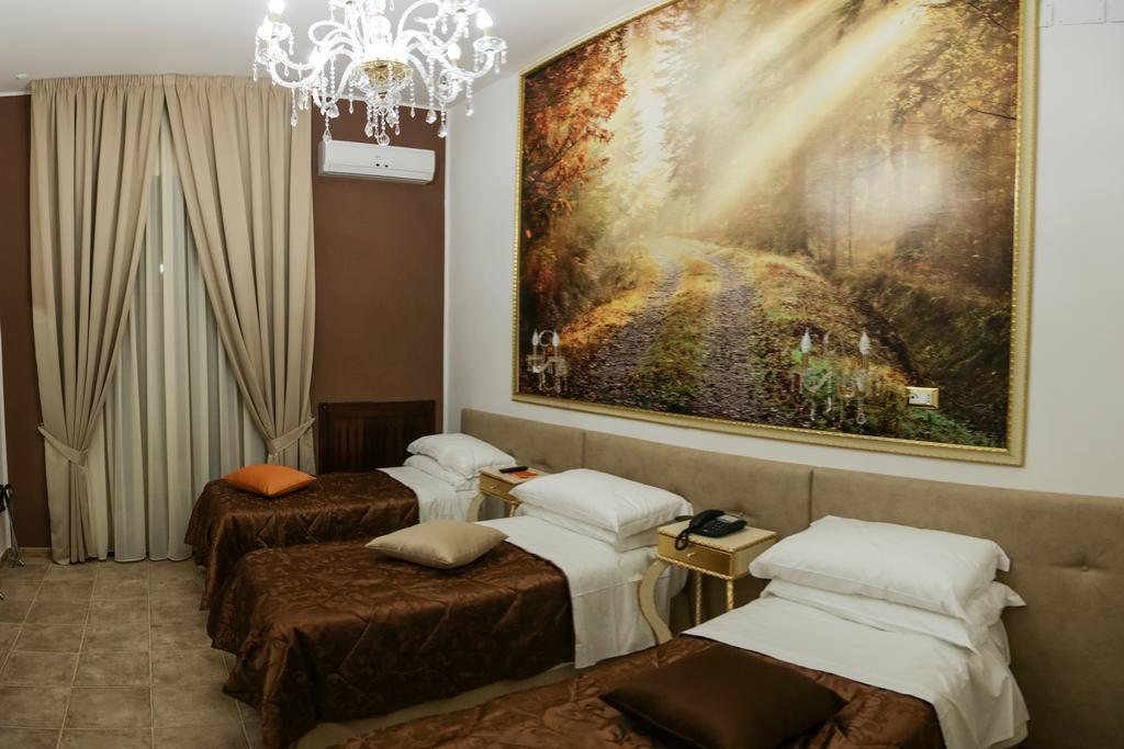 Deluxe Quadruple Room,109932132:JPEG